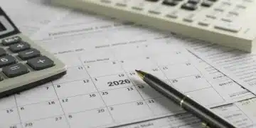 Calendar 2026 with tax documents and calculator for financial planning
